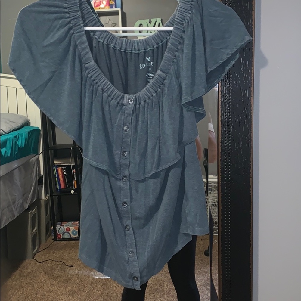 An off the shoulder shirt.